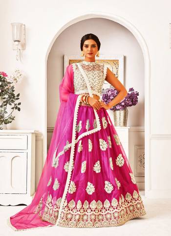Garb This Partywear Heavy Designer Lehenga Choli And Dupatta In Fine Color Fabricated On Blouse Mono Net And Lahenga And Dupatta Are Mono Net Beautified With Heavy Attractive Work. 