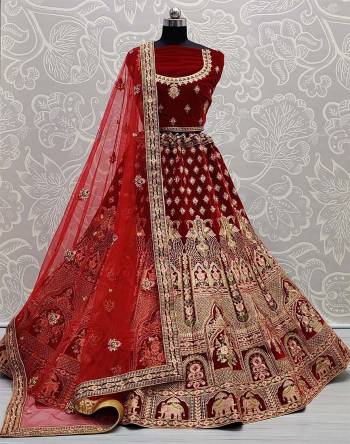 Look Attrective This Wedding Partywear Heavy Designer Lehenga Choli And Dupatta In Fine Color Fabricated On Velvet Beautified With Heavy Attractive Dori,Thread Embroidery Work. 