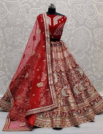 Look Attrective This Wedding Partywear Heavy Designer Lehenga Choli And Dupatta In Fine Color Fabricated On Velvet Beautified With Heavy Attractive Dori,Thread Embroidery Work. 