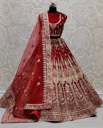 Look Attrective This Wedding Partywear Heavy Designer Lehenga Choli And Dupatta In Fine Color Fabricated On Velvet Beautified With Heavy Attractive Dori,Thread Embroidery Work. 