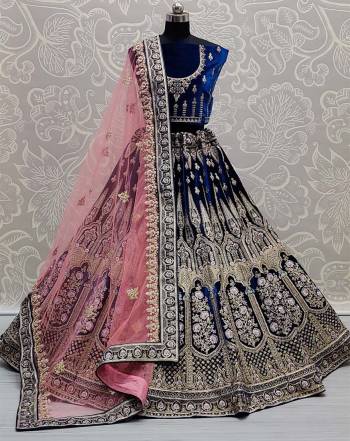 Look Attrective This Wedding Partywear Heavy Designer Lehenga Choli And Dupatta In Fine Color Fabricated On Velvet Beautified With Heavy Attractive Dori,Thread Embroidery Work. 