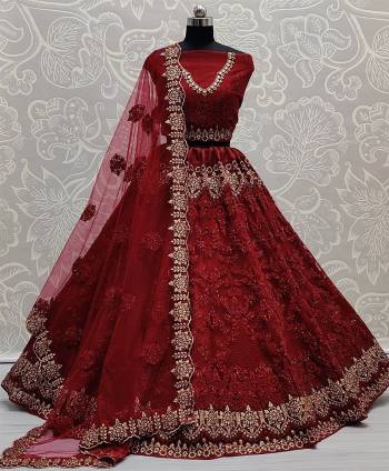Attrective This Wedding Partywear Heavy Designer Lehenga Choli And Dupatta In Fine Color Fabricated On Net Beautified With Heavy Attractive Designer Embroidery Work. 