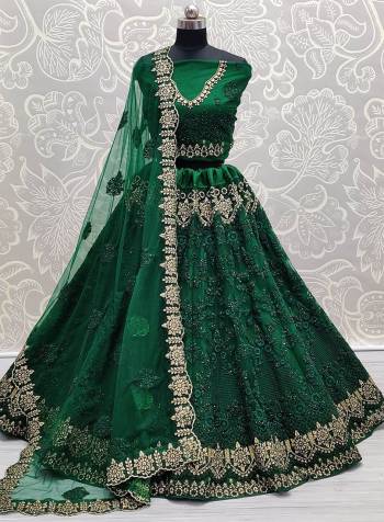 Attrective This Wedding Partywear Heavy Designer Lehenga Choli And Dupatta In Fine Color Fabricated On Net Beautified With Heavy Attractive Designer Embroidery Work. 