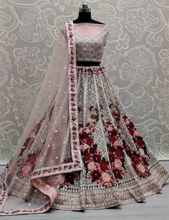 Attrective This Wedding Partywear Heavy Designer Lehenga Choli And Dupatta In Fine Color Fabricated On Net Beautified With Heavy Attractive Designer Embroidery Work. 