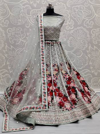 Attrective This Wedding Partywear Heavy Designer Lehenga Choli And Dupatta In Fine Color Fabricated On Net Beautified With Heavy Attractive Designer Embroidery Work. 