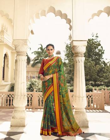 Garb This Partywear Saree Are Fine Saree Paired With Blouse.This Saree Are Brasso Based And Blouse Art Silk Fabric With Heavy Wevon Designer With Brasso Cutting Printed. Buy This Pretty Saree Now.