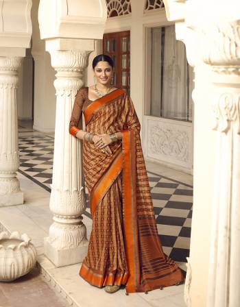 Garb This Partywear Saree Are Fine Saree Paired With Blouse.This Saree Are Brasso Based And Blouse Art Silk Fabric With Heavy Wevon Designer With Brasso Cutting Printed. Buy This Pretty Saree Now.