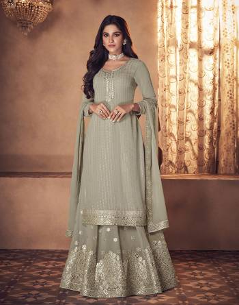 Attrective Look This Designer Long Length Readymade Suit In Lovely Color.Its Pretty Heavy Designer Mirror Thread Embroidery Work Top Is Georgette Based Paired With Georgette Bottom And Chinon Fabricated Dupatta Which Gives An Attractive To The Suit.