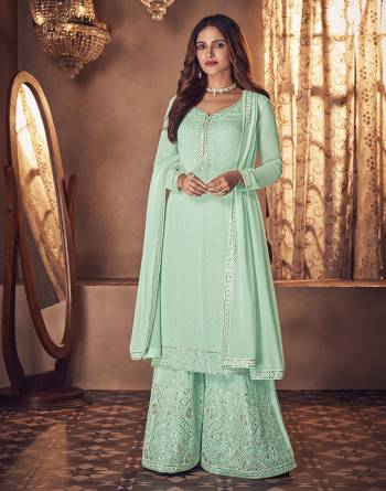 Attrective Look This Designer Long Length Readymade Suit In Lovely Color.Its Pretty Heavy Designer Mirror Thread Embroidery Work Top Is Georgette Based Paired With Georgette Bottom And Chinon Fabricated Dupatta Which Gives An Attractive To The Suit.