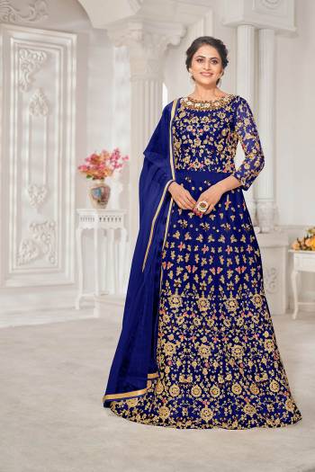 Garb This Designer Long Length Suit In Lovely Color.Its Pretty Heavy Designer Thread,Jari Embroidery Work Top Is Net Based Paired With Silk Bottom And Net Fabricated Dupatta Which Gives An Attractive To The Suit.