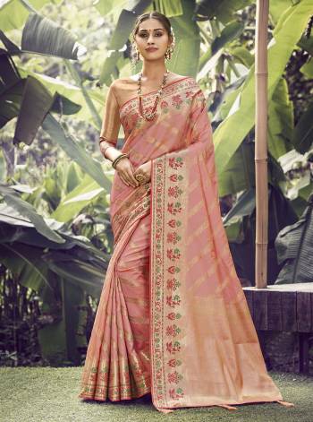 Garb This Pretty Angelic Look Wearing This Heavy Designer Wevon Work Saree In Fine Color Paired With Blouse. This Saree And Blouse Is Fabricated On Silk Paired. Its Pretty Color Pallete Will Give An Attractive Look To Your Personality. 