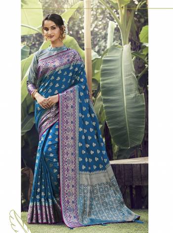 Garb This Pretty Angelic Look Wearing This Heavy Designer Wevon Work Saree In Fine Color Paired With Blouse. This Saree And Blouse Is Fabricated On Silk Paired. Its Pretty Color Pallete Will Give An Attractive Look To Your Personality. 
