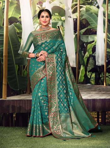 Garb This Pretty Angelic Look Wearing This Heavy Designer Wevon Work Saree In Fine Color Paired With Blouse. This Saree And Blouse Is Fabricated On Silk Paired. Its Pretty Color Pallete Will Give An Attractive Look To Your Personality. 