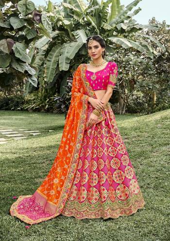 Look Attrective This Wedding Partywear Heavy Designer Lehenga Choli And Dupatta In Fine Color Fabricated On Silk Beautified With Heavy Attractive Wevon Designer,Embroidery,Stone Hand Work. 