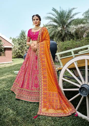 Look Attrective This Wedding Partywear Heavy Designer Lehenga Choli And Dupatta In Fine Color Fabricated On Silk Beautified With Heavy Attractive Wevon Designer,Embroidery,Stone Hand Work. 