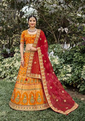 Look Attrective This Wedding Partywear Heavy Designer Lehenga Choli And Dupatta In Fine Color Fabricated On Silk Beautified With Heavy Attractive Wevon Designer,Embroidery,Stone Hand Work. 
