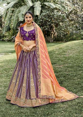 Look Attrective This Wedding Partywear Heavy Designer Lehenga Choli And Dupatta In Fine Color Fabricated On Silk Beautified With Heavy Attractive Wevon Designer,Embroidery,Stone Hand Work. 