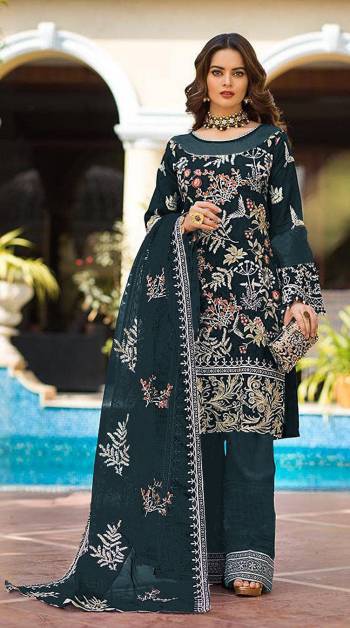 Garb This Designer Pakistani Suit In Lovely Color.Its Pretty Heavy Designer Thread,Jari Embroidery Work Top Is Faux Georgette Based Paired With Santoon Bottom And Naznin Fabricated Dupatta Which Gives An Attractive To The Suit.