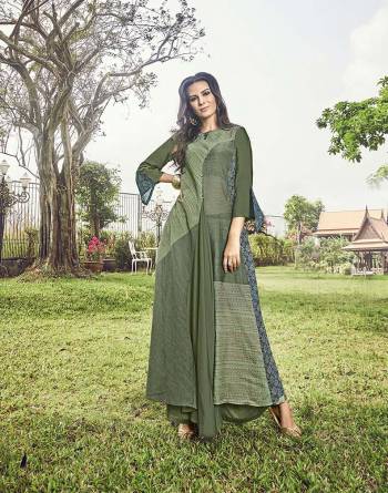 Get Ready For The Upcoming Festive And Wedding Season With This Designer Readymade Kurti In Olive Green Color Fabricated On Modal Jacquard. This Kurti Is Beautified With Prints And Thread Work. Buy Now.