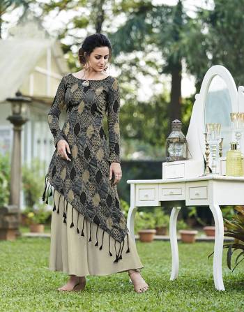 If Comfort IS Your First Priority Than Grab This Designer Gown In Grey Color Paired With A Black And Grey Colored Top Over It Fabricated On Silk Jacquard. Buy Now.