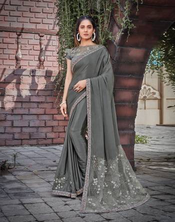 Looking This Stylist Partywear Saree Are Fine Saree Paired With Blouse.This Saree Satin Silk And Blouse Are Raw Silk Fabric With Heavy Designer Embroidery Work. Buy This Pretty Saree Now.