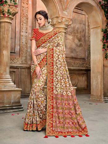 Garb This Pretty Angelic Patan Patola Look Wearing This Heavy Designer Resham Mirror Khatli And Cut Dana Work Saree In Fine Color Paired With 2 Blouse. This Saree And Blouse Is Fabricated On Silk Paired. Its Attractive Look To Your Personality. 