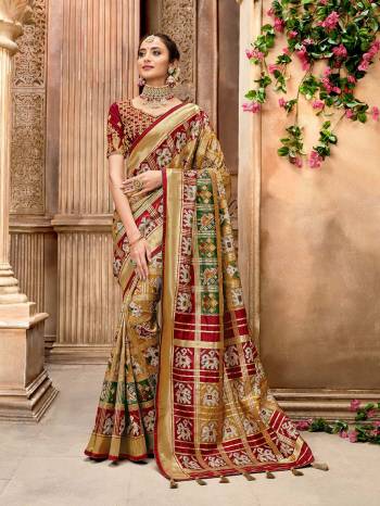 Garb This Pretty Angelic Patan Patola Look Wearing This Heavy Designer Resham Mirror Khatli And Cut Dana Work Saree In Fine Color Paired With 2 Blouse. This Saree And Blouse Is Fabricated On Silk Paired. Its Attractive Look To Your Personality. 