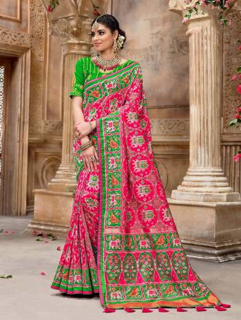 Garb This Pretty Angelic Patan Patola Look Wearing This Heavy Designer Resham Mirror Khatli And Cut Dana Work Saree In Fine Color Paired With 2 Blouse. This Saree And Blouse Is Fabricated On Silk Paired. Its Attractive Look To Your Personality. 