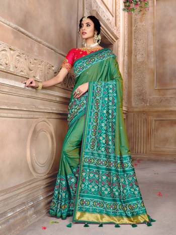 Garb This Pretty Angelic Patan Patola Look Wearing This Heavy Designer Resham Mirror Khatli And Cut Dana Work Saree In Fine Color Paired With 2 Blouse. This Saree And Blouse Is Fabricated On Silk Paired. Its Attractive Look To Your Personality. 