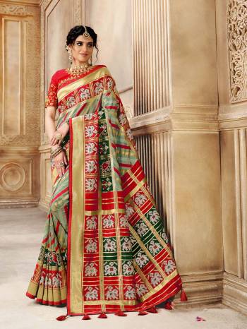 Garb This Pretty Angelic Patan Patola Look Wearing This Heavy Designer Resham Mirror Khatli And Cut Dana Work Saree In Fine Color Paired With 2 Blouse. This Saree And Blouse Is Fabricated On Silk Paired. Its Attractive Look To Your Personality. 