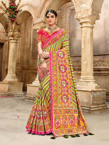 Garb This Pretty Angelic Patan Patola Look Wearing This Heavy Designer Resham Mirror Khatli And Cut Dana Work Saree In Fine Color Paired With 2 Blouse. This Saree And Blouse Is Fabricated On Silk Paired. Its Attractive Look To Your Personality. 