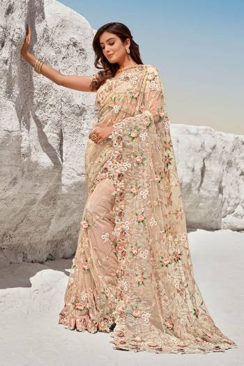 Attrective This Pretty Angelic Look Wearing This Partywear Heavy Designer Fancy Flower And Hand Work Saree With Blouse. This Saree Are Net And Blouse Is Turkey Silk Fabricated Paired. Its Pretty Attractive Look To Your Personality. 