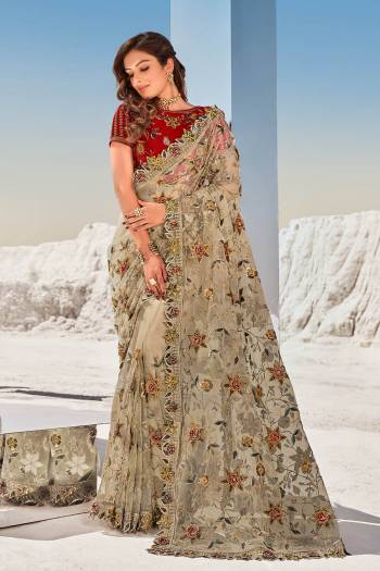 Attrective This Pretty Angelic Look Wearing This Partywear Heavy Designer Fancy Flower And Hand Work Saree With Blouse. This Saree Are Net And Blouse Is Turkey Silk Fabricated Paired. Its Pretty Attractive Look To Your Personality. 