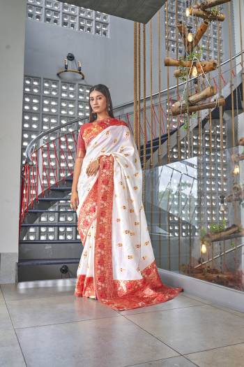 Stylist This Partywear Saree Are Fine Saree Paired With Blouse.This Saree And Blouse Are Kanjivaram Silk Based Fabric With Heavy Jacquard Designer Work. Buy This Pretty Saree Now.