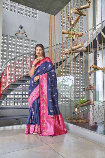 Stylist This Partywear Saree Are Fine Saree Paired With Blouse.This Saree And Blouse Are Kanjivaram Silk Based Fabric With Heavy Jacquard Designer Work. Buy This Pretty Saree Now.