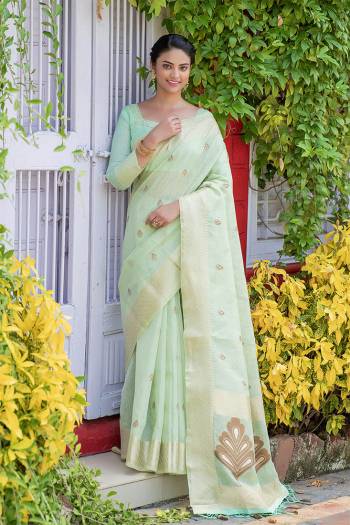 Attrective This Fastival Saree Are Fine Saree Paired With Blouse.This Saree And Blouse Are Linen Based Fabric With Heavy Wevon Designer Pallu And Butti Work. Buy This Pretty Saree Now.