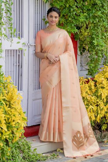 Attrective This Fastival Saree Are Fine Saree Paired With Blouse.This Saree And Blouse Are Linen Based Fabric With Heavy Wevon Designer Pallu And Butti Work. Buy This Pretty Saree Now.