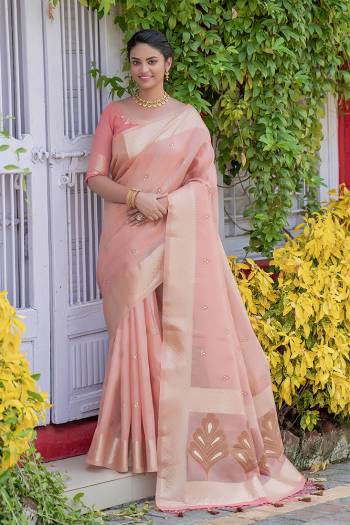 Attrective This Fastival Saree Are Fine Saree Paired With Blouse.This Saree And Blouse Are Linen Based Fabric With Heavy Wevon Designer Pallu And Butti Work. Buy This Pretty Saree Now.