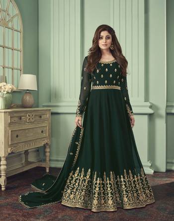 Attrective This Designer Long Length Suit In Lovely Color.Its Pretty Heavy Designer Thread Embroidery Work Top Is Georgette Based Paired With Santoon Bottom And Georgette Fabricated Dupatta Which Gives An Attractive To The Suit.