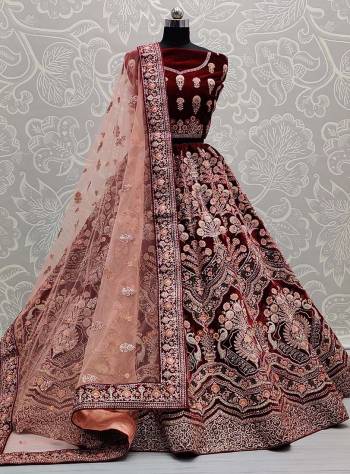 Attrective This Wedding Partywear Heavy Designer Lehenga Choli And Dupatta In Fine Color Fabricated On Velvet Beautified With Heavy Attractive Designer Embroidery And Zarkan Diamond Work. 