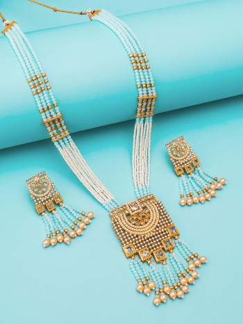 Attrective Look To Your Personality By Pairing Up This Beautiful Necklace Set With Your Ethnic Attire. This Pretty Set Is In Sky Blue Color Beautified With Kundan Work. Buy Now.