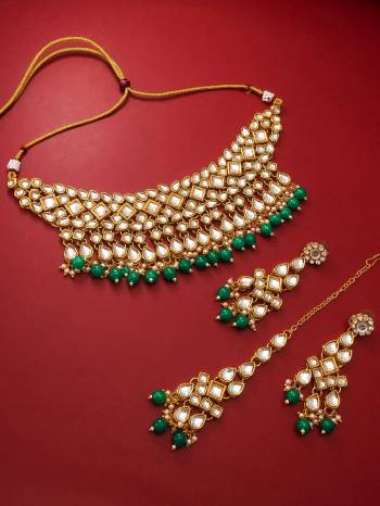 Attrective Look To Your Personality By Pairing Up This Beautiful Necklace Set With Your Ethnic Attire. This Pretty Set Is In Green Color Beautified With Kundan Work. Buy Now.