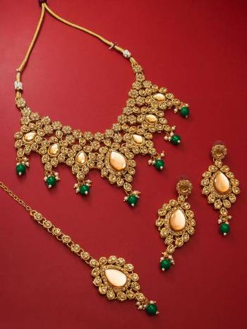 Attrective Look To Your Personality By Pairing Up This Beautiful Necklace Set With Your Ethnic Attire. This Pretty Set Is In Green Color Beautified With Kundan Work. Buy Now.