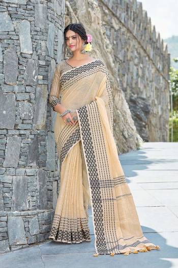 Garb This Partywear Saree Are Fine Saree Paired With Blouse.This Saree And Blouse Are Linen Based Fabric With Wevon Designer Work. Buy This Pretty Saree Now.