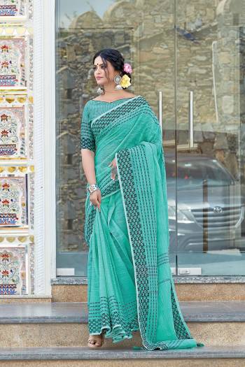 Garb This Partywear Saree Are Fine Saree Paired With Blouse.This Saree And Blouse Are Linen Based Fabric With Wevon Designer Work. Buy This Pretty Saree Now.