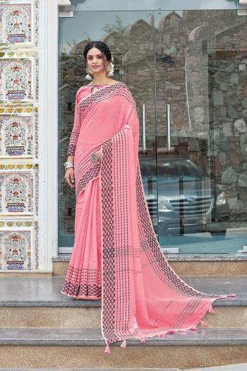 Garb This Partywear Saree Are Fine Saree Paired With Blouse.This Saree And Blouse Are Linen Based Fabric With Wevon Designer Work. Buy This Pretty Saree Now.