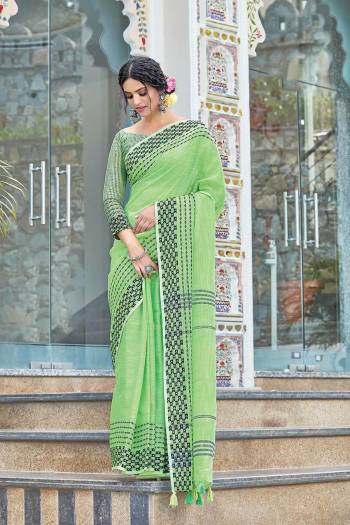 Garb This Partywear Saree Are Fine Saree Paired With Blouse.This Saree And Blouse Are Linen Based Fabric With Wevon Designer Work. Buy This Pretty Saree Now.