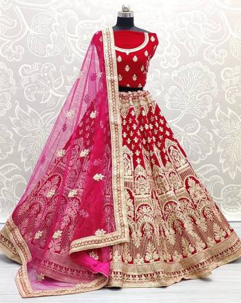 Stylist This Wedding Partywear Heavy Designer Lehenga Choli And Dupatta In Fine Color Fabricated On Velvet Beautified With Heavy Attractive Designer Embroidery And Zarkan Diamond Work. 