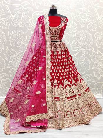 Stylist This Wedding Partywear Heavy Designer Lehenga Choli And Dupatta In Fine Color Fabricated On Velvet Beautified With Heavy Attractive Designer Embroidery And Zarkan Diamond Work. 