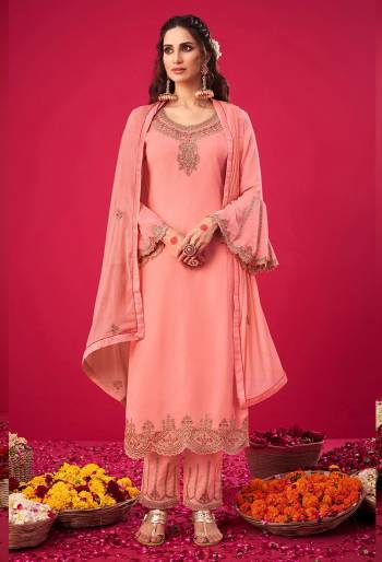 Garb This Designer Suit In Lovely Color.Its Pretty Heavy Designer Thread,Jari Embroidery Work Top Is Georgette Based Paired With Santoon Bottom And Naznin Fabricated Dupatta Which Gives An Attractive To The Suit.